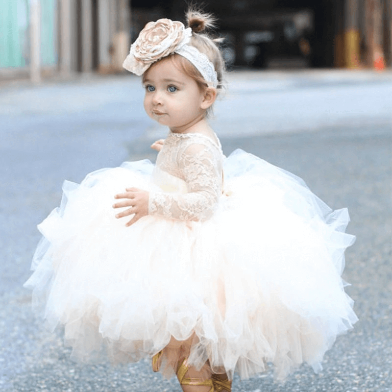 Robe blanche et rose pour bébé fille chez DM'Sports