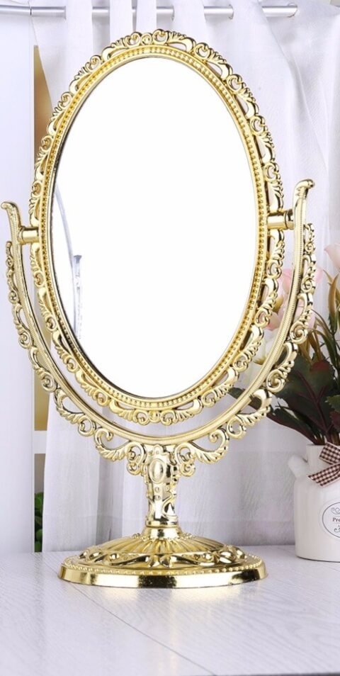Miroir ovale doree
