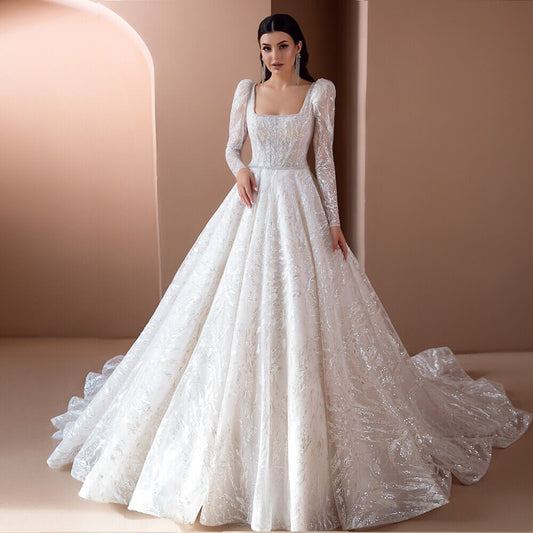 Robe de mariee princesse manche longue